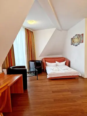 Ein Bett oder Betten in einem Zimmer der Unterkunft Hotel Kaiser