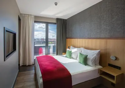 Ein Bett oder Betten in einem Zimmer der Unterkunft Ocak Hotel