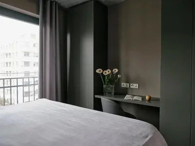 Ein Bett oder Betten in einem Zimmer der Unterkunft Art Apartments