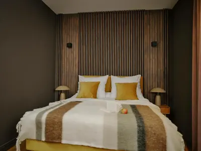 Ein Bett oder Betten in einem Zimmer der Unterkunft Art Apartments