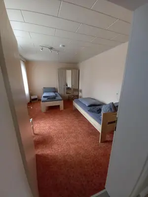 Ein Bett oder Betten in einem Zimmer der Unterkunft Quartier 6