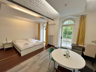 Ein Bett oder Betten in einem Zimmer der Unterkunft GLS Studio Hotel Berlin