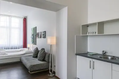 Ein Bett oder Betten in einem Zimmer der Unterkunft GLS Studio Hotel Berlin