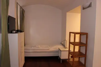 Ein Bett oder Betten in einem Zimmer der Unterkunft GLS Studio Hotel Berlin