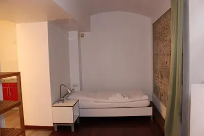 Ein Bett oder Betten in einem Zimmer der Unterkunft GLS Studio Hotel Berlin
