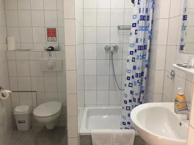 Ein Badezimmer in der Unterkunft Pension Classic