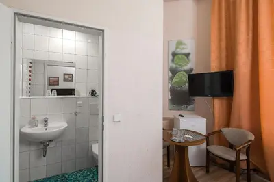 Ein Badezimmer in der Unterkunft Pension Classic