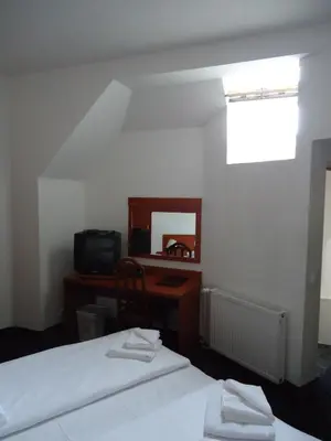 Ein Bett oder Betten in einem Zimmer der Unterkunft City Hotel am Kurfürstendamm