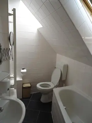Ein Badezimmer in der Unterkunft City Hotel am Kurfürstendamm