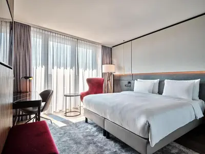 Ein Bett oder Betten in einem Zimmer der Unterkunft Radisson Collection Hotel, Berlin