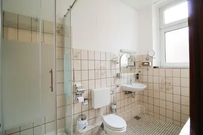 Ein Badezimmer in der Unterkunft Hotel Margrit