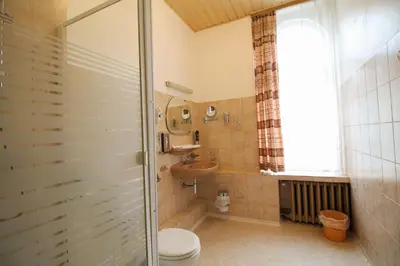 Ein Badezimmer in der Unterkunft Hotel Margrit