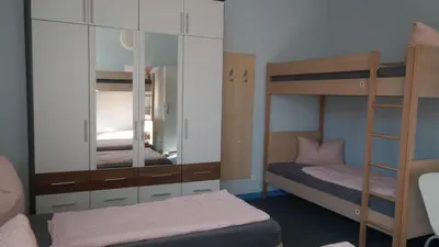 Ein Bett oder Betten in einem Zimmer der Unterkunft Hostel Inn-Berlin