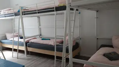 Ein Bett oder Betten in einem Zimmer der Unterkunft Hostel Inn-Berlin