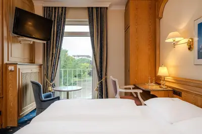 Ein Bett oder Betten in einem Zimmer der Unterkunft Ringhotel Seehof