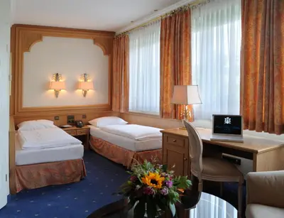 Ein Bett oder Betten in einem Zimmer der Unterkunft Ringhotel Seehof