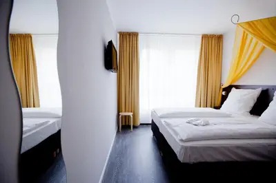 Ein Bett oder Betten in einem Zimmer der Unterkunft Hotel Kiez Pension Berlin