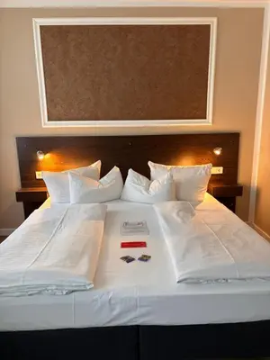 Ein Bett oder Betten in einem Zimmer der Unterkunft Hotel Kiez Pension Berlin