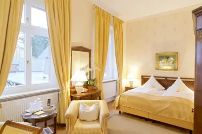 Ein Bett oder Betten in einem Zimmer der Unterkunft Hotel Villa Monte Vino