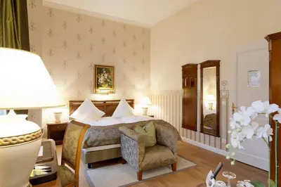 Ein Bett oder Betten in einem Zimmer der Unterkunft Hotel Villa Monte Vino