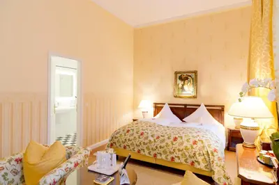 Ein Bett oder Betten in einem Zimmer der Unterkunft Hotel Villa Monte Vino