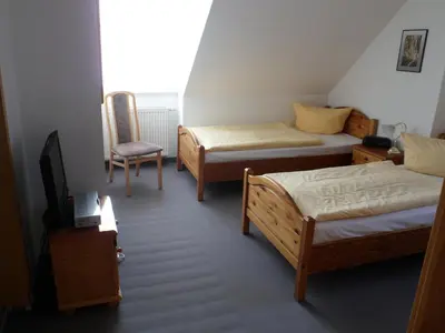 Ein Bett oder Betten in einem Zimmer der Unterkunft Stadtsee-Pension Templin