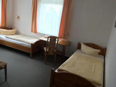 Ein Bett oder Betten in einem Zimmer der Unterkunft Stadtsee-Pension Templin