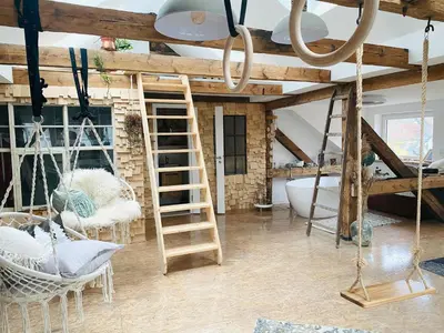 Ein Etagenbett oder Etagenbetten in einem Zimmer der Unterkunft Loft im Herzen der Stadt