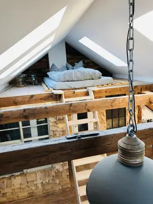 Ein Bett oder Betten in einem Zimmer der Unterkunft Loft im Herzen der Stadt