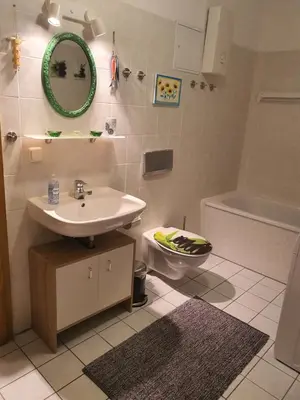 Ein Badezimmer in der Unterkunft CARLO familienfreundliches 3-Raum Apartment auf der DOM-Insel