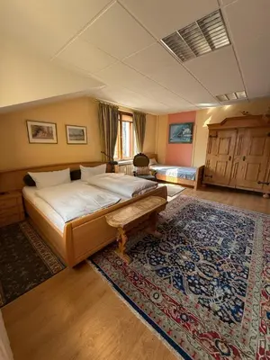 Ein Bett oder Betten in einem Zimmer der Unterkunft Pension am Tiefen See