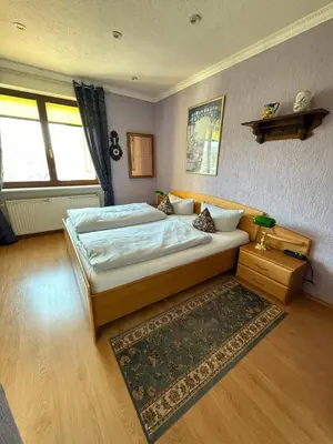 Ein Bett oder Betten in einem Zimmer der Unterkunft Pension am Tiefen See