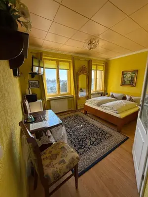 Ein Bett oder Betten in einem Zimmer der Unterkunft Pension am Tiefen See