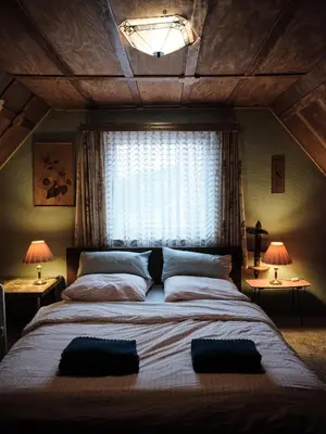 Ein Bett oder Betten in einem Zimmer der Unterkunft Guesthouse with 3 apartments, just outside Berlin, near to Tesla