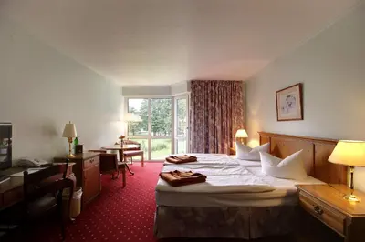 Ein Bett oder Betten in einem Zimmer der Unterkunft Hotel Fährkrug
