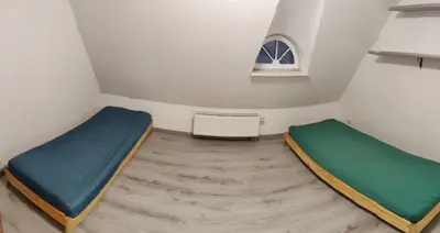 Ein Bett oder Betten in einem Zimmer der Unterkunft Ferienhaus Elstal