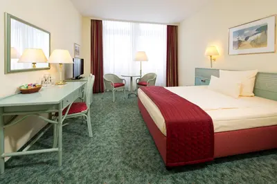 Ein Bett oder Betten in einem Zimmer der Unterkunft Hotel Steglitz International