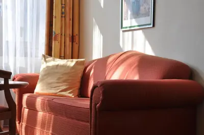 Ein Sitzbereich in der Unterkunft Hotel Steglitz International