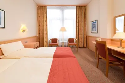 Ein Bett oder Betten in einem Zimmer der Unterkunft Hotel Steglitz International
