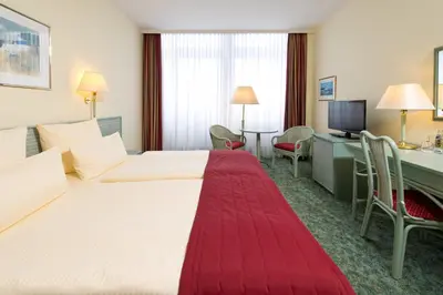 Ein Bett oder Betten in einem Zimmer der Unterkunft Hotel Steglitz International