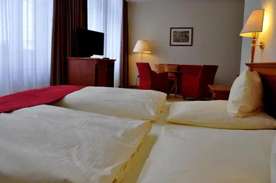 Ein Bett oder Betten in einem Zimmer der Unterkunft Hotel Steglitz International