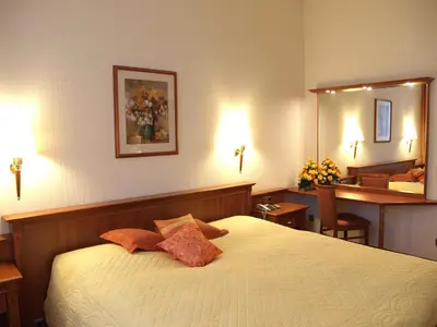 Ein Bett oder Betten in einem Zimmer der Unterkunft Hotel Steglitz International
