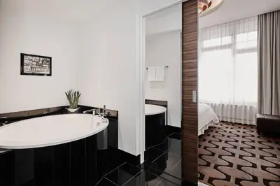 Ein Bett oder Betten in einem Zimmer der Unterkunft Roomers Berlin Steinplatz, Autograph Collection