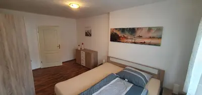 Ein Bett oder Betten in einem Zimmer der Unterkunft Ferienhaus Fichtenwalde, 160m², 3 SZ, 2 Bäder, bis 6 Personen, Garten, VDSL