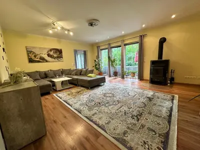Ein Sitzbereich in der Unterkunft Ferienhaus Fichtenwalde, 160m², 3 SZ, 2 Bäder, bis 6 Personen, Garten, VDSL