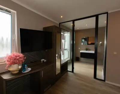 Ein Bett oder Betten in einem Zimmer der Unterkunft Hotel Barnimer Hof