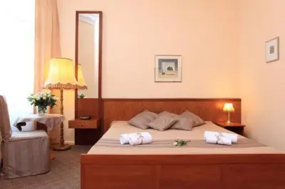 Ein Bett oder Betten in einem Zimmer der Unterkunft Hotel Arche