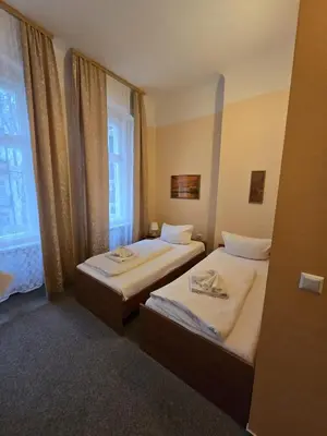 Ein Bett oder Betten in einem Zimmer der Unterkunft Hotel Arche