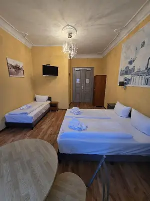 Ein Bett oder Betten in einem Zimmer der Unterkunft Hotel Arche