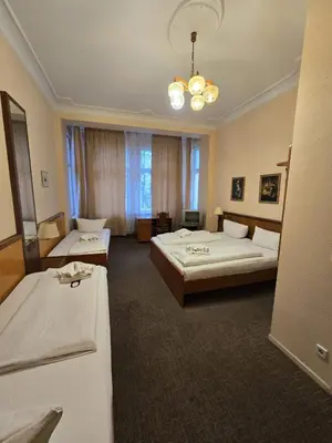 Ein Bett oder Betten in einem Zimmer der Unterkunft Hotel Arche